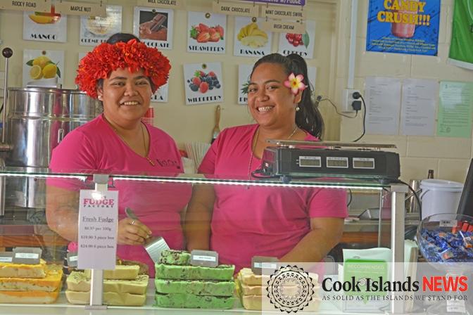 Fudge maker Mae-jo Vikta with trainee Memory Koiatu in front of some of the many fudge varieties available at Cooks Fudge Factory